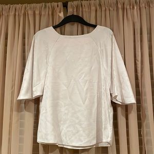 Brand new with tags. Cream top.